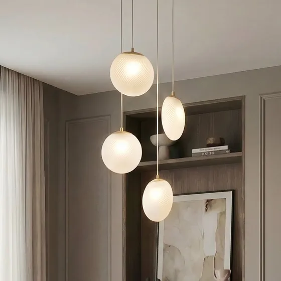 Lucande Lunelle Pendelleuchte, 4-flammig, Messing & Glas, Ø 40 cm