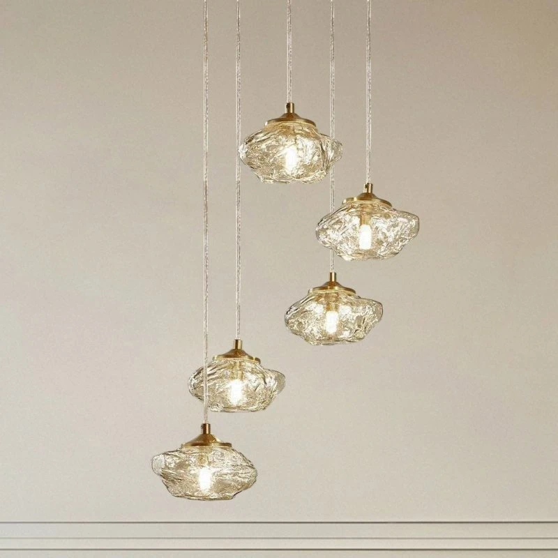 Lindby Piatra Pendelleuchte 5-flammig Amber/Messing Ø45cm