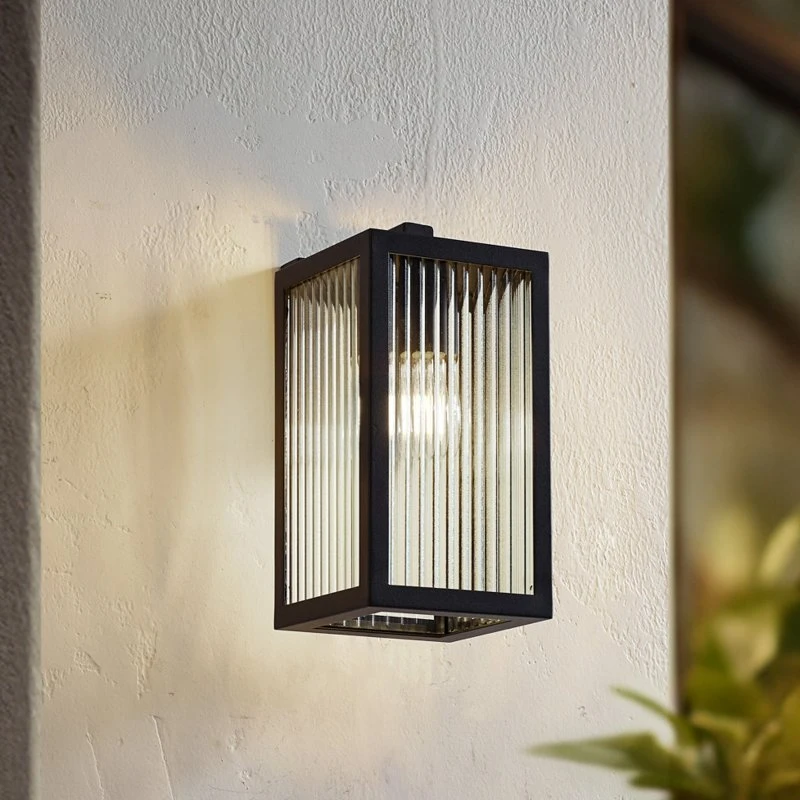 Lindby Außenwandleuchte Bolgar, 15cm, Schwarz, Metall & Glas