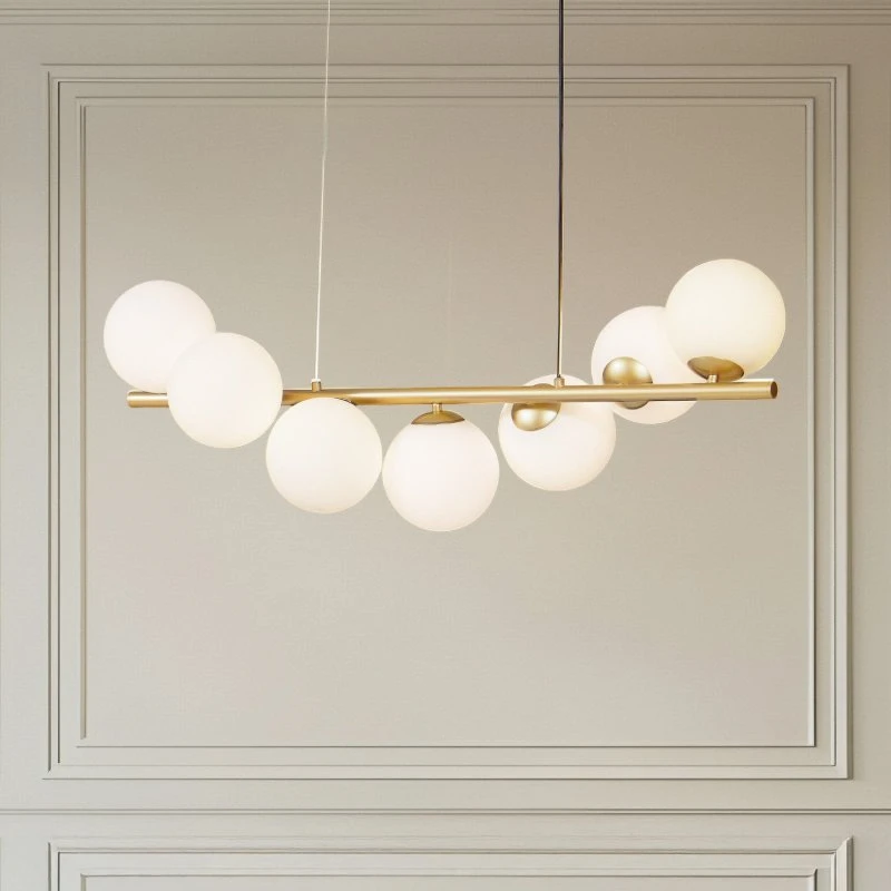 Lucande Isandro 7-flammige Pendelleuchte Gold/Opal - 95 cm